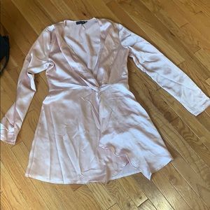 Long sleeve. Low neck dress. Never worn.